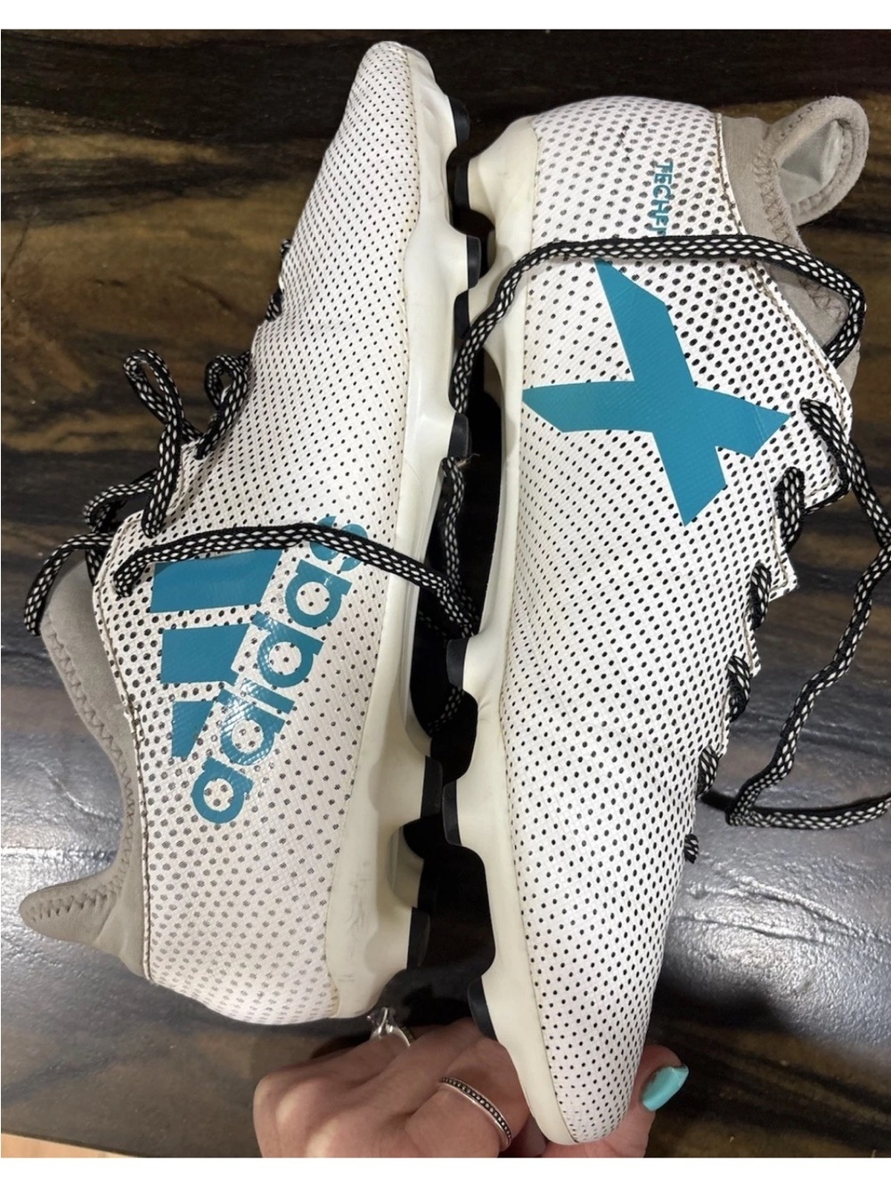 Adidas X 17.3 FG football cleats in a white and teal colorway. Size 10&1/2